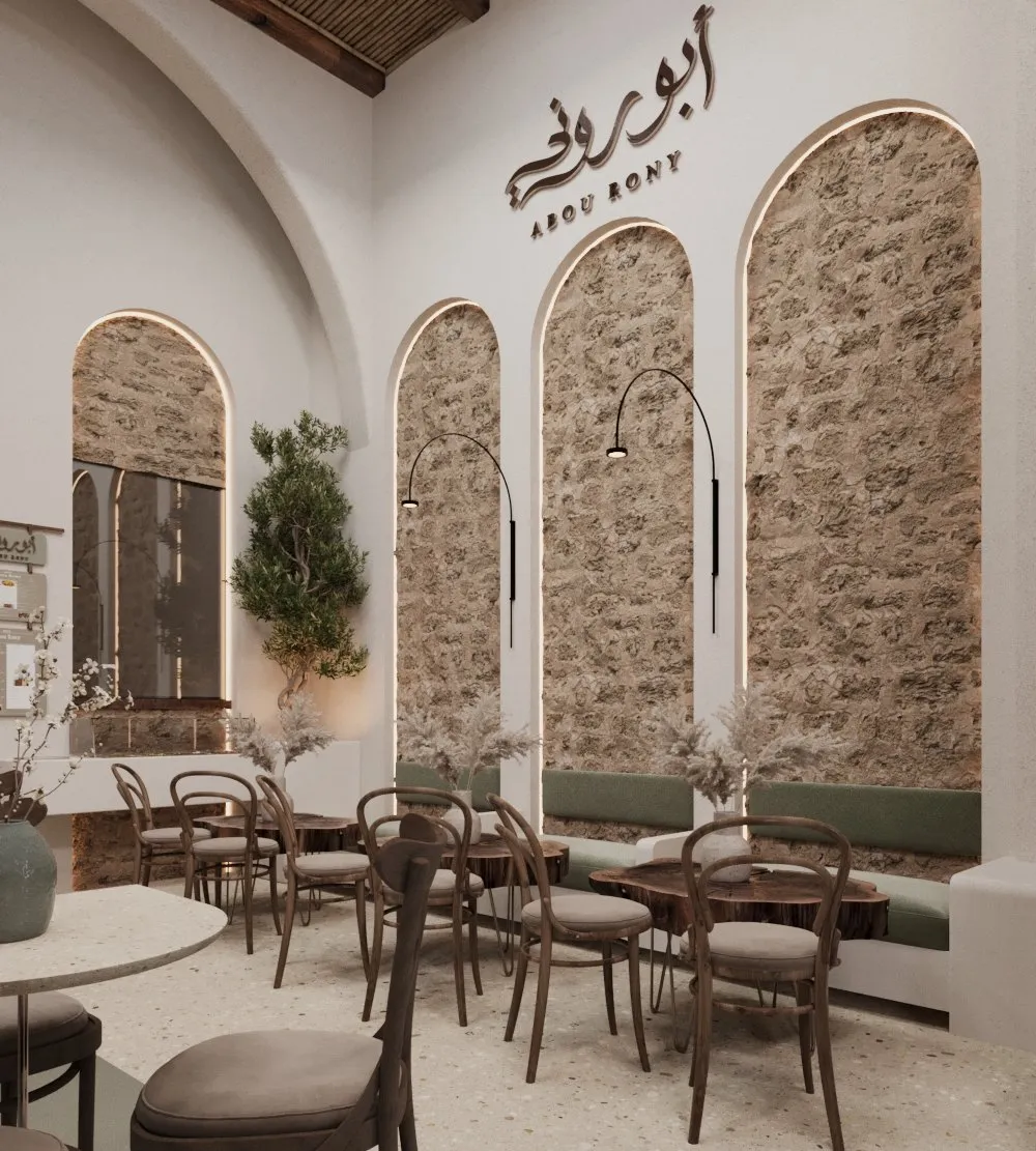 Dining area with stone clad arched niches and green banquette seating