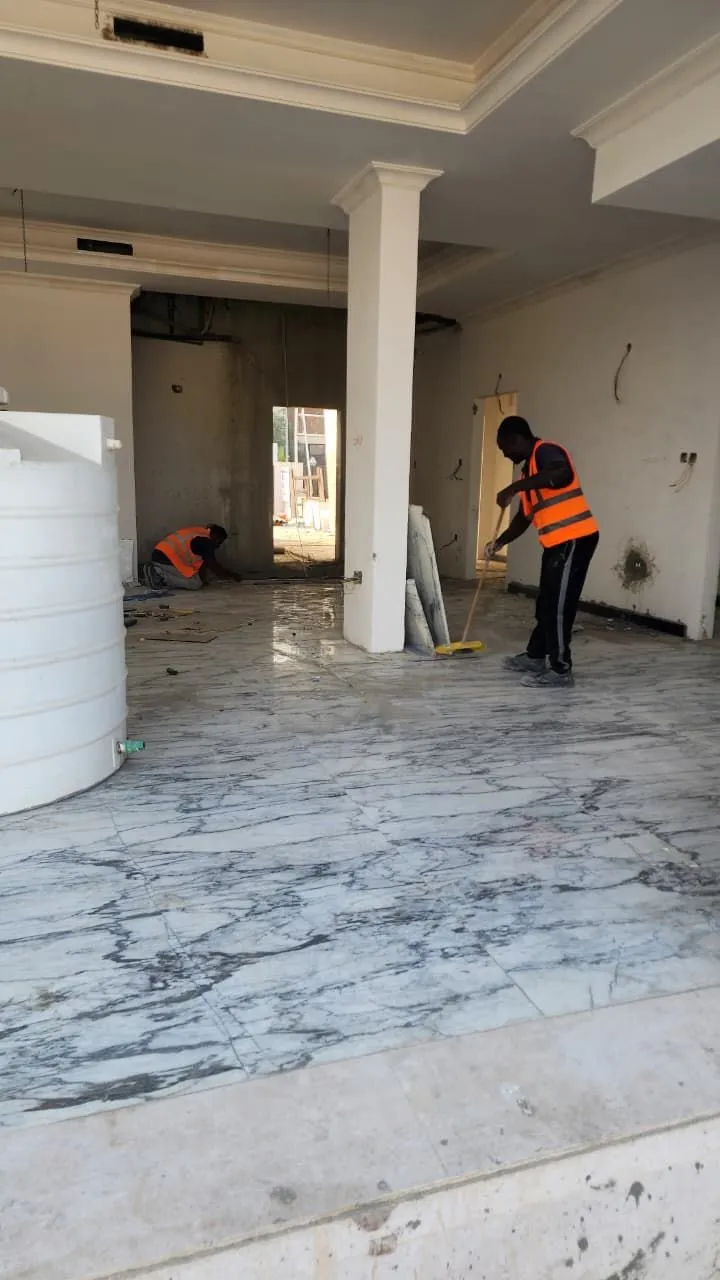 Finished interior with polished marble flooring and gypsum cornice