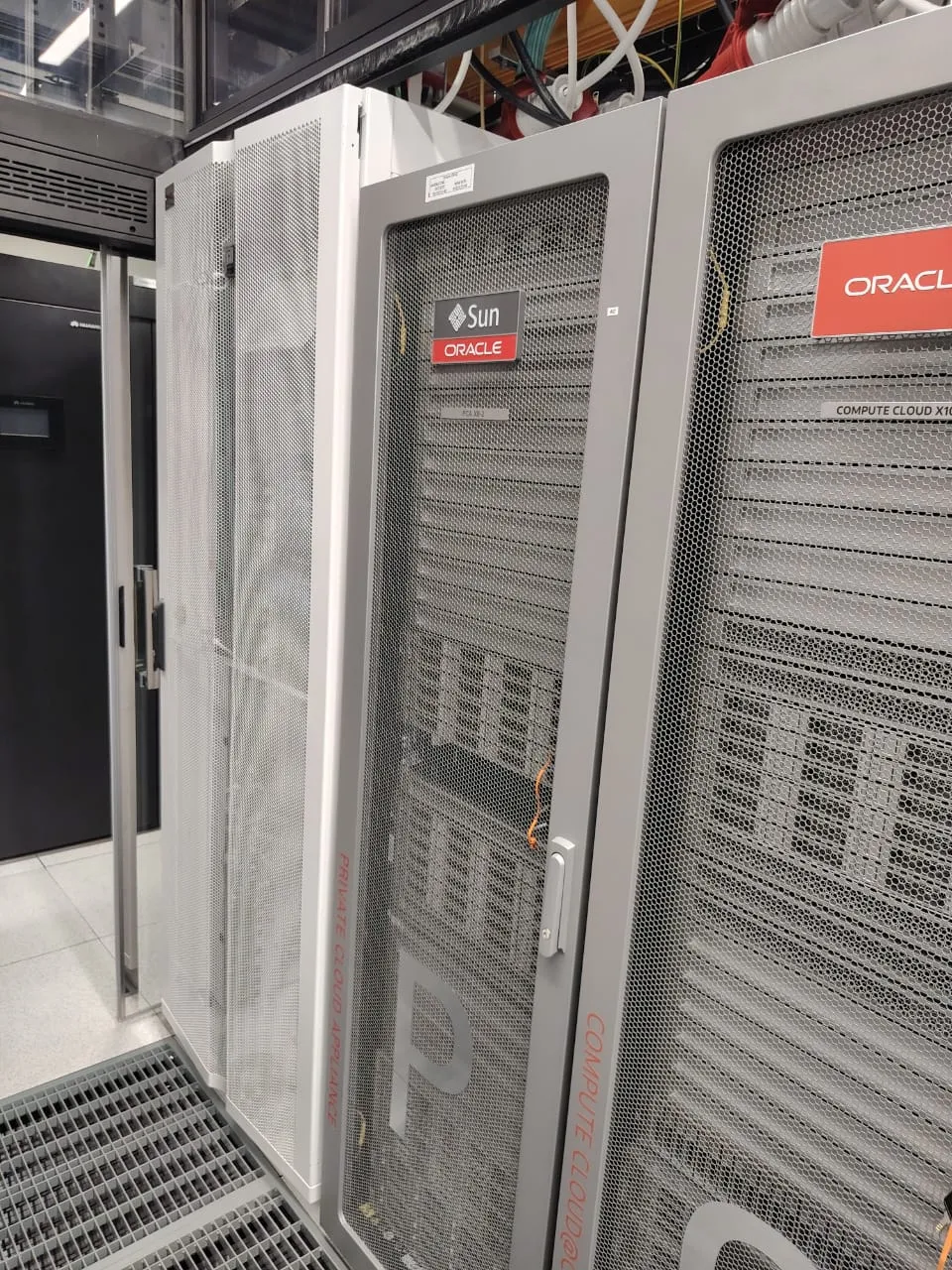 Enterprise private cloud appliance cabinets standing on a raised floor